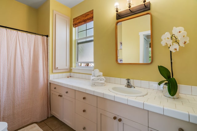 bathroom featuring vanity and tile patterned floors