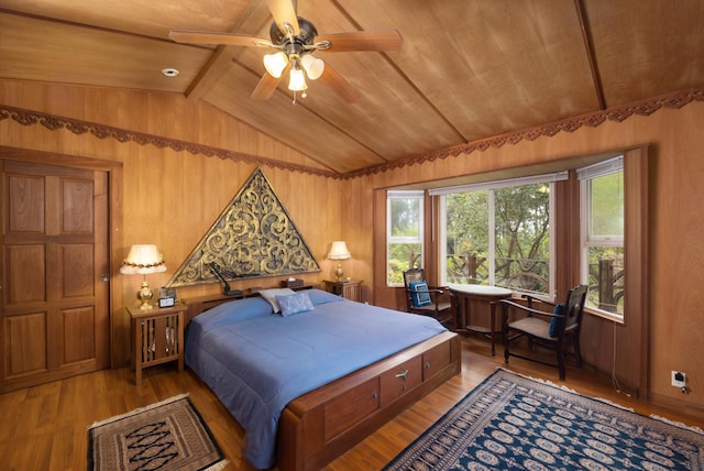 bedroom with ceiling fan, wooden ceiling, vaulted ceiling, and hardwood / wood-style flooring