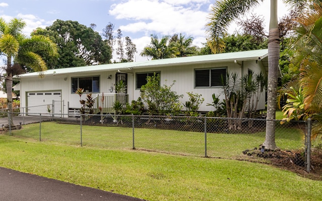 single story home with a garage and a front yard