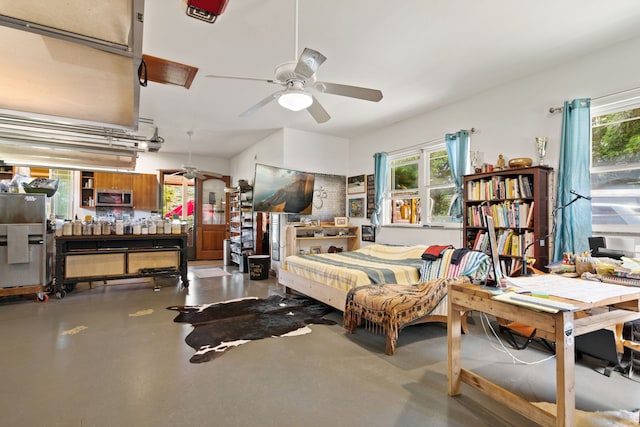 bedroom with concrete flooring, multiple windows, and ceiling fan