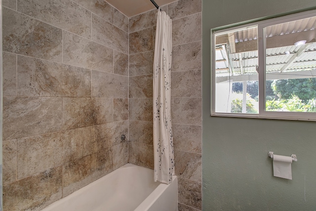 bathroom featuring shower / bath combo