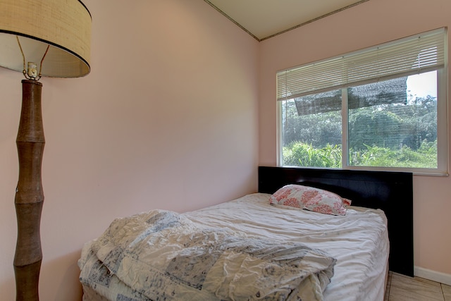 bedroom featuring multiple windows