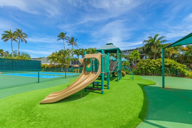 view of playground featuring tennis court