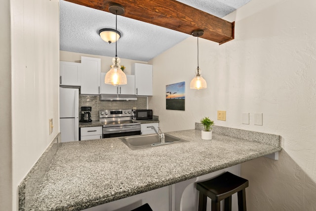 kitchen with stainless steel range with electric stovetop, sink, pendant lighting, white refrigerator, and white cabinets