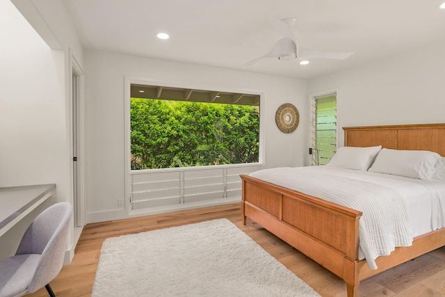 bedroom featuring ceiling fan and light wood-type flooring