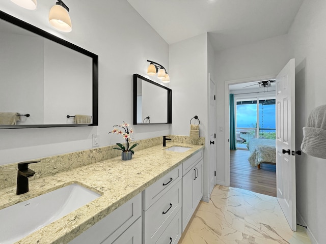 bathroom featuring dual vanity, tile patterned flooring, and ceiling fan