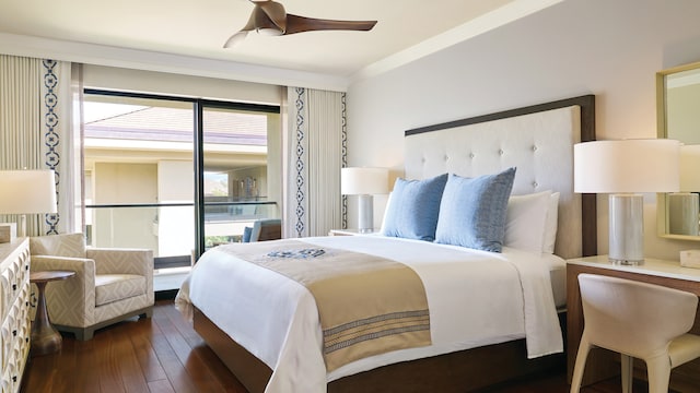 bedroom featuring ceiling fan and hardwood / wood-style floors