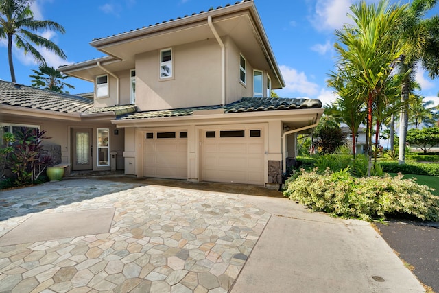 view of front of property featuring a garage