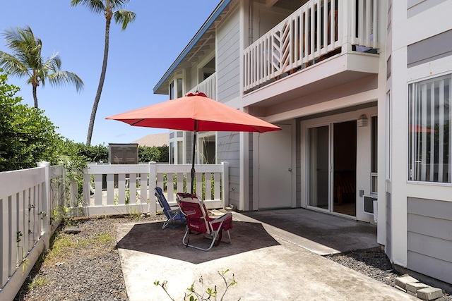 view of patio with a balcony