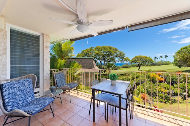 view of patio featuring a balcony and a ceiling fan