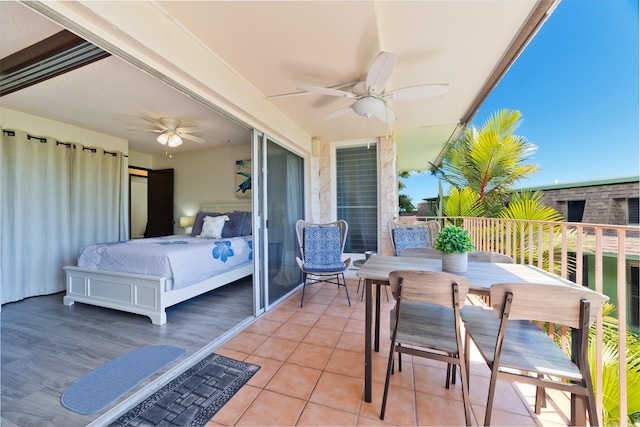 exterior space featuring ceiling fan