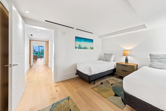 bedroom with light hardwood / wood-style flooring