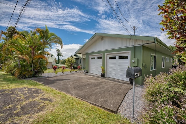 back of house with a lawn and central air condition unit