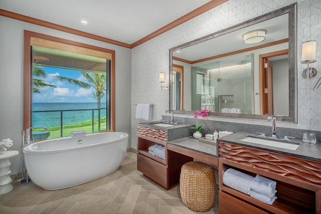 bathroom featuring separate shower and tub, tile patterned floors, a water view, vanity, and ornamental molding