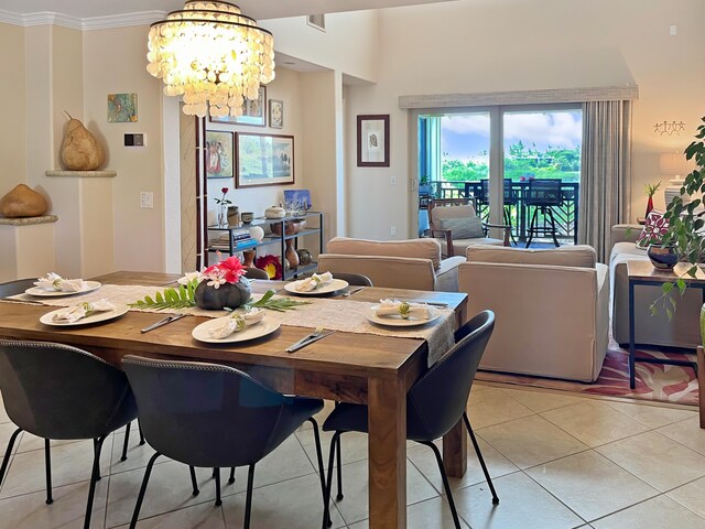 kitchen with crown molding, stainless steel appliances, and light stone counters