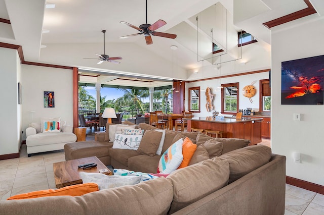 tiled living room featuring high vaulted ceiling and ceiling fan