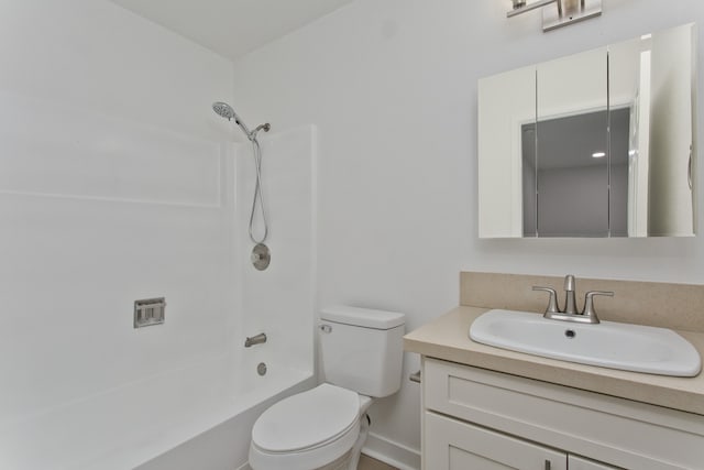 full bathroom with washtub / shower combination, toilet, and vanity