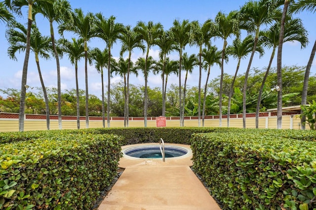 view of pool featuring central AC and a community hot tub