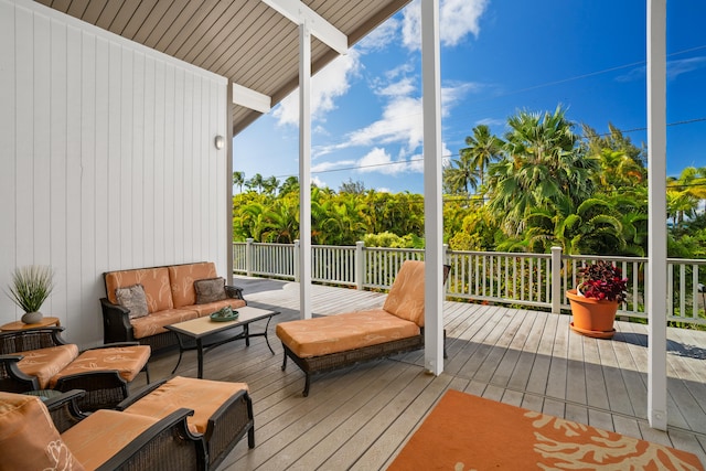 wooden deck featuring outdoor lounge area