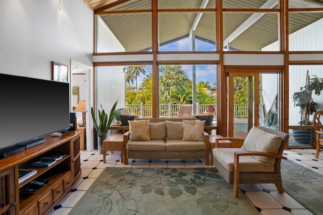 sunroom / solarium featuring lofted ceiling