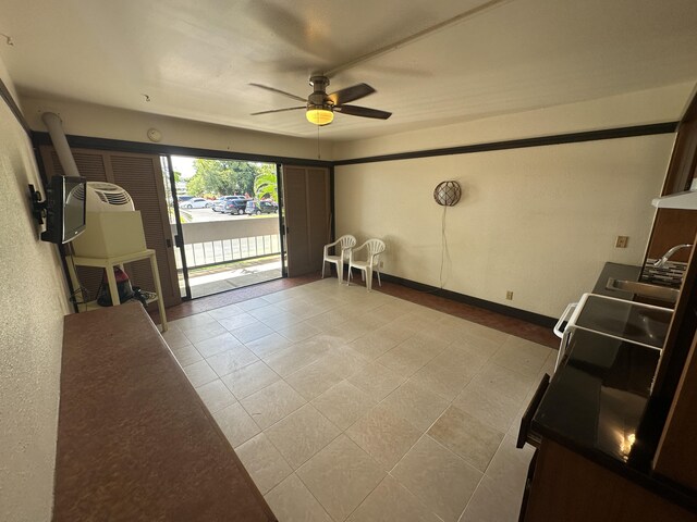 interior space with tile patterned flooring and a textured ceiling