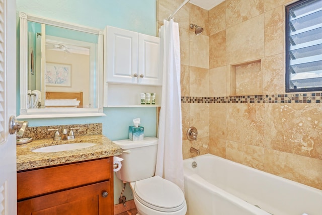 full bathroom with vanity, toilet, and shower / bath combo