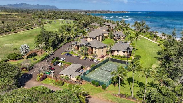 birds eye view of property featuring a water and mountain view