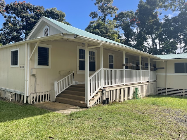 view of front of home with a front yard