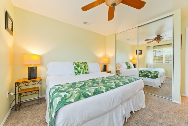 bedroom featuring a closet, carpet floors, and ceiling fan