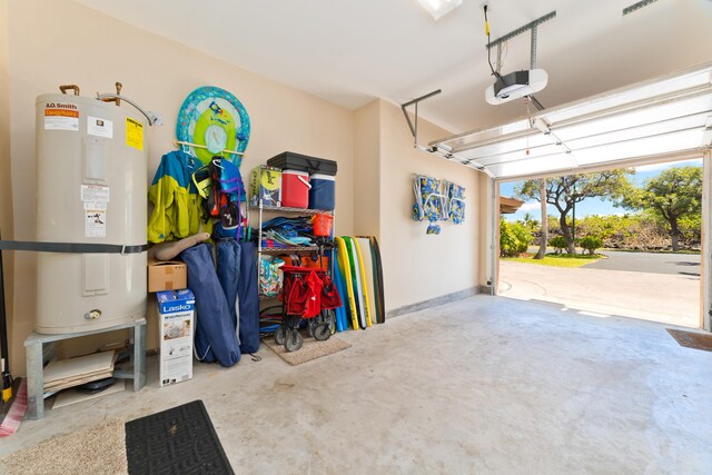 garage featuring a garage door opener and water heater