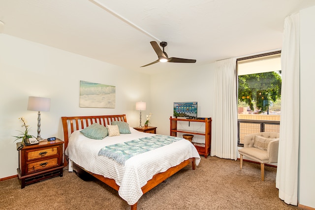 bedroom featuring ceiling fan and carpet flooring