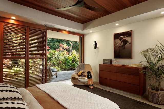 bedroom featuring wood ceiling, access to exterior, and ceiling fan