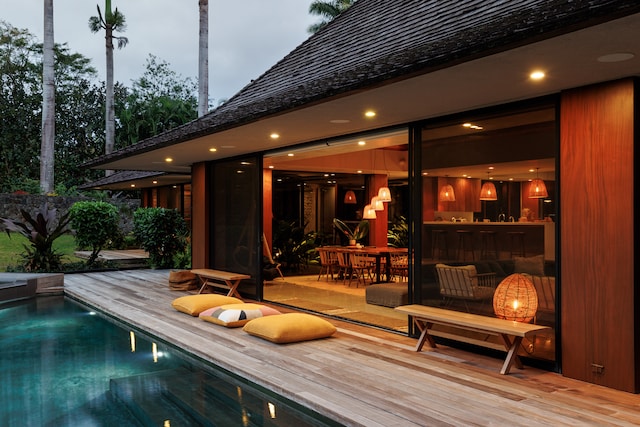 view of swimming pool with a wooden deck