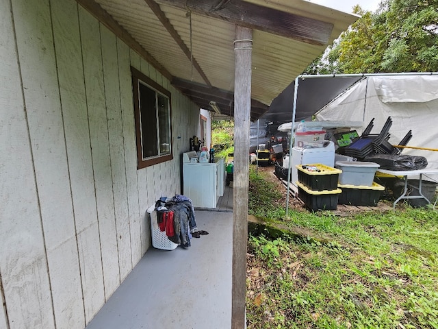 exterior space with washer and dryer