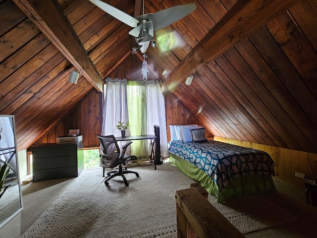 unfurnished bedroom featuring wooden walls, lofted ceiling with beams, carpet flooring, ceiling fan, and wood ceiling