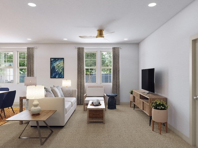 carpeted living room with ceiling fan