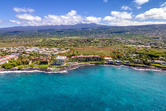 bird's eye view featuring a water and mountain view