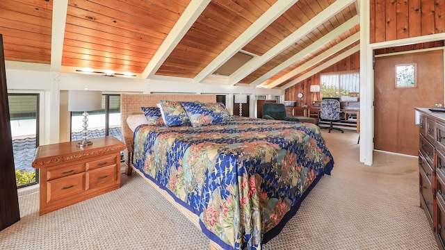 carpeted bedroom featuring lofted ceiling with beams, wooden walls, and wood ceiling