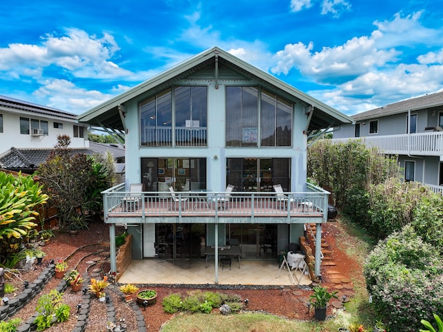 rear view of property with a patio area