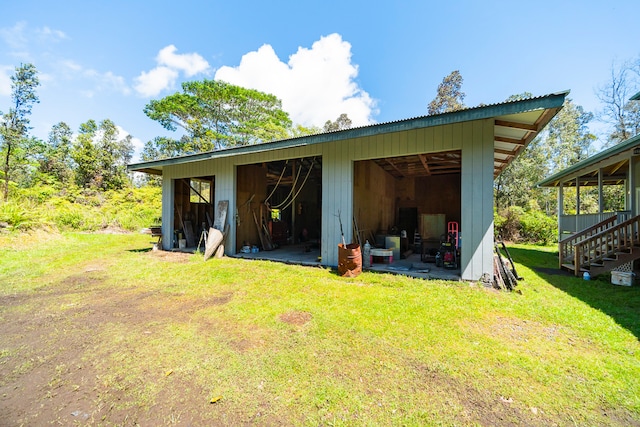 garage with a yard