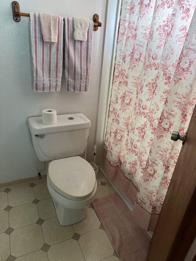 bathroom featuring toilet