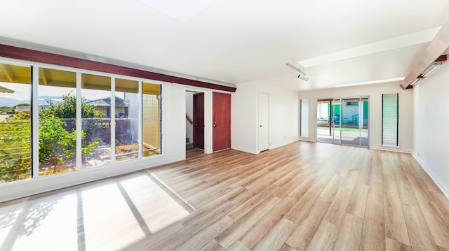 unfurnished room featuring light hardwood / wood-style floors