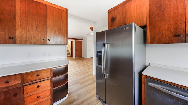 kitchen featuring stainless steel refrigerator with ice dispenser and light wood-type flooring