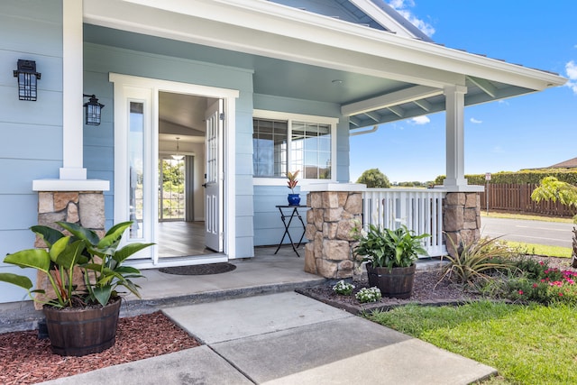 doorway to property featuring a porch