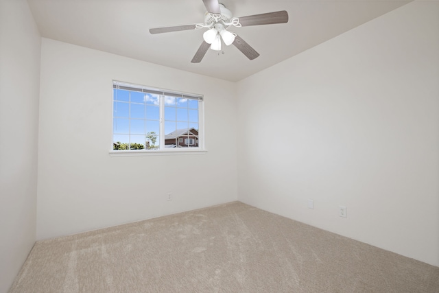 empty room with carpet floors and ceiling fan