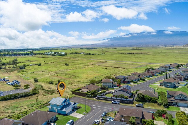 birds eye view of property featuring a rural view