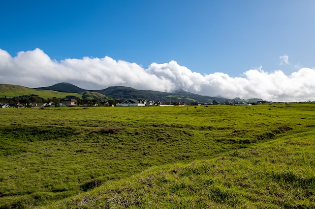 property view of mountains featuring a rural view