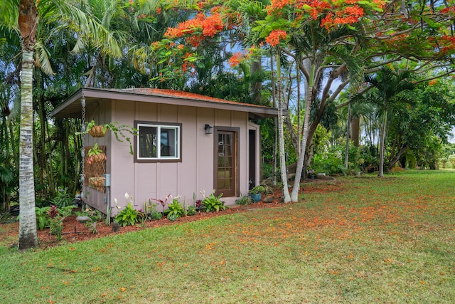 view of outdoor structure with a yard