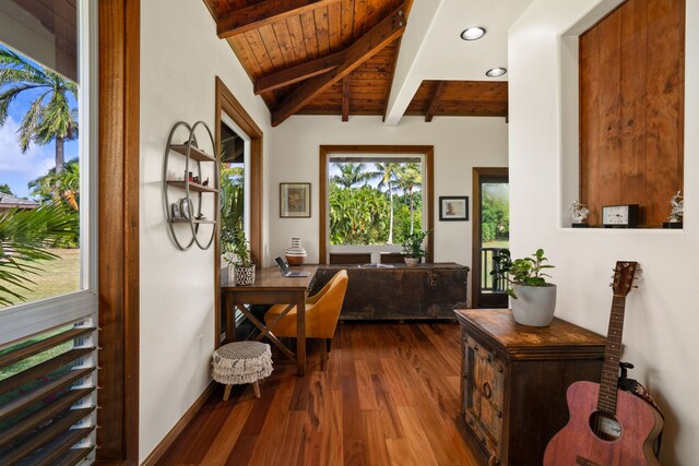 bedroom featuring multiple windows, hardwood / wood-style flooring, access to exterior, and ceiling fan