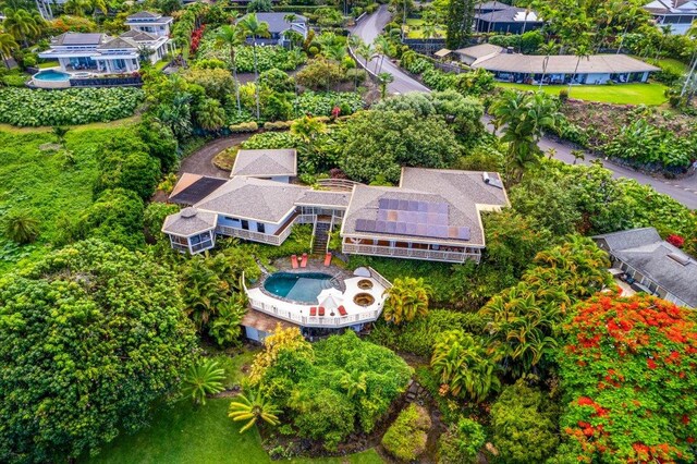 view of pool with a water view and a fire pit